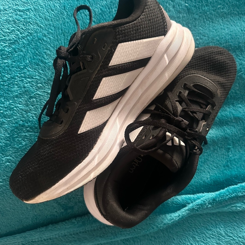 Adidas Black and White Athletic Shoes with Mesh Upper